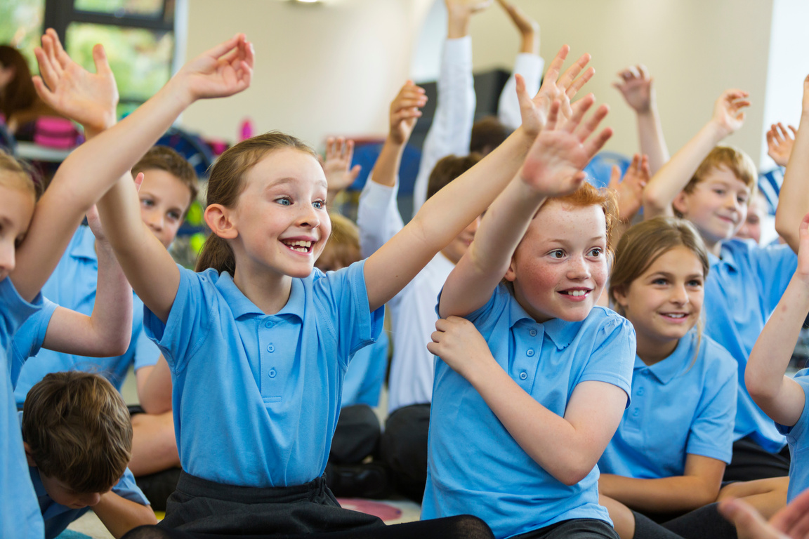 Excited Elementary Students in Uniform