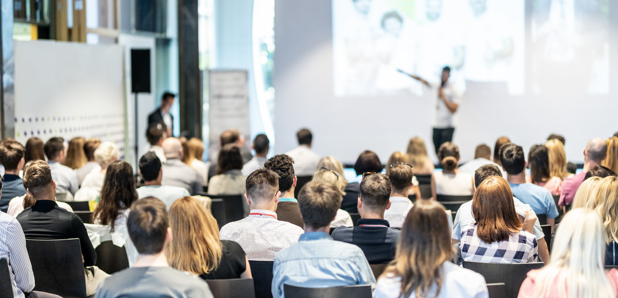 Speaker giving a talk at a school search event